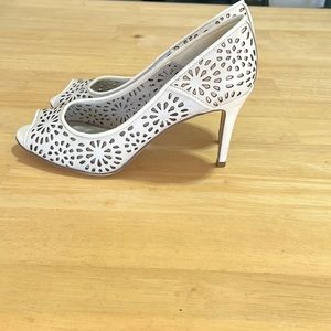 Floral Punch Out Peep-Toe White Pumps